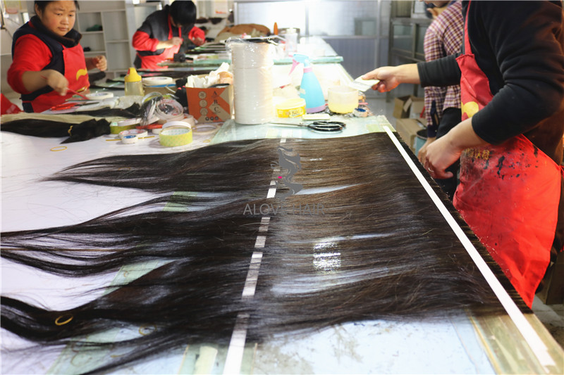 100 remy human hair tape in extensions.jpg